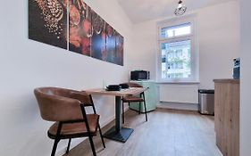 Alpha Apartments